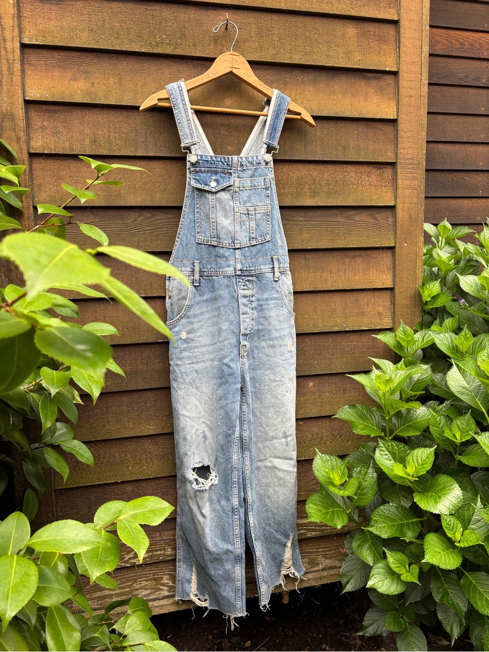 We The Free Light Blue Distressed Denim Overalls